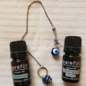 evil eye diffuser pendulum with oils